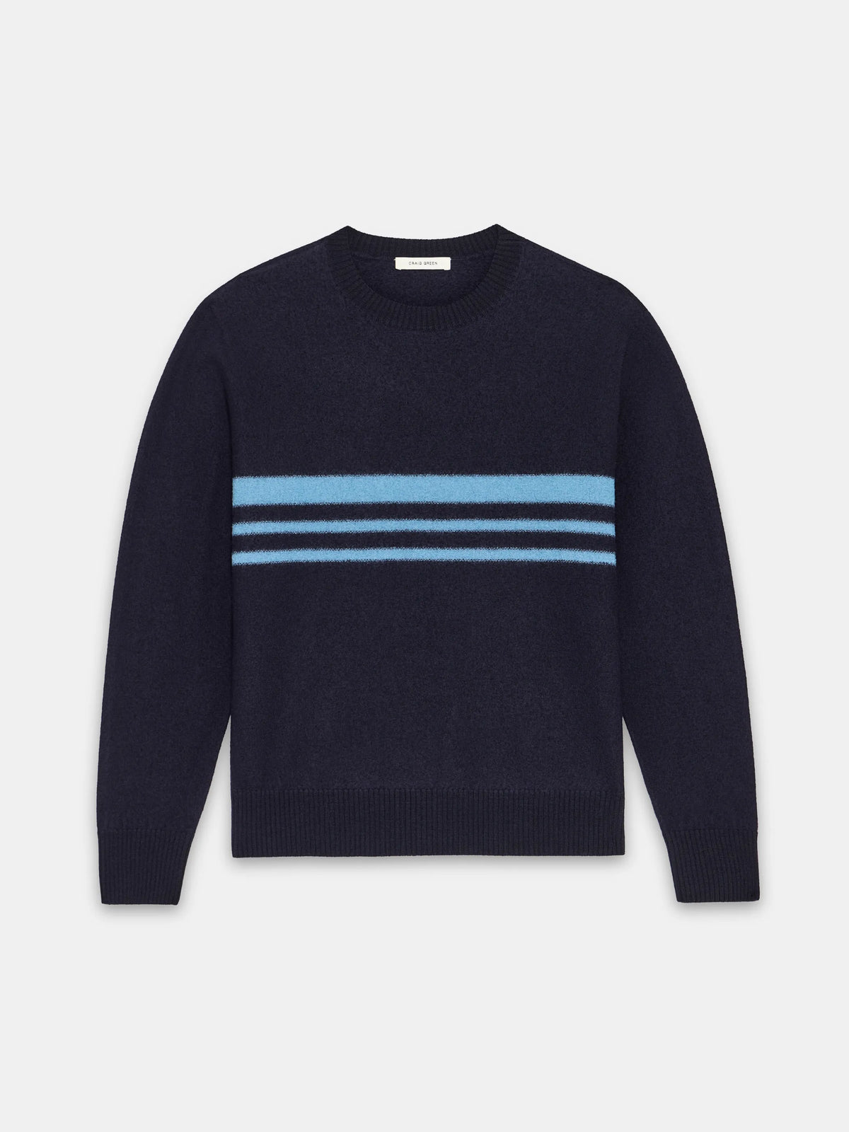 Navy and blue midweight knit felt stripe jumper by Craig Green flat front view showing the chest stripe design