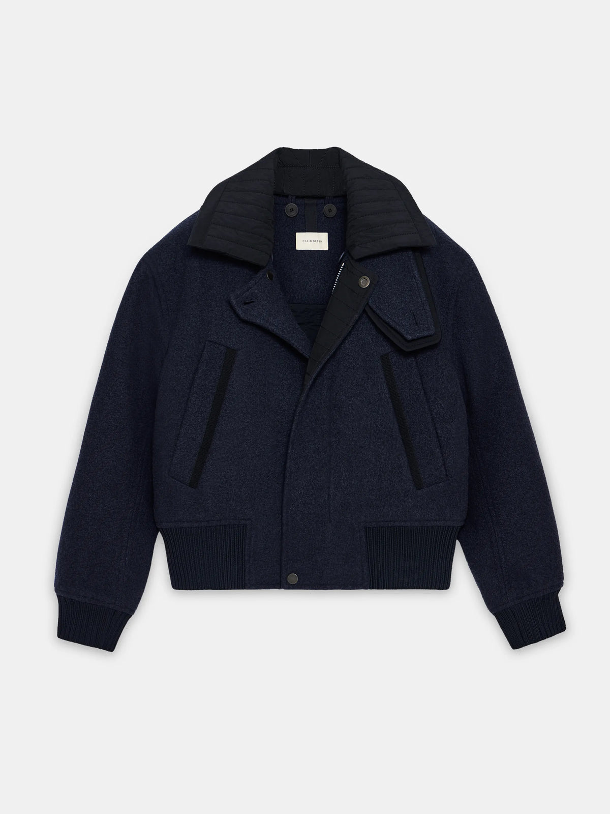 Navy flight jacket by Craig Green flat front view showing the heavyweight washed Italian wool construction
